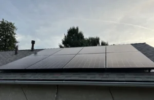 Rooftop solar panels installed on a home, showcasing clean energy solutions