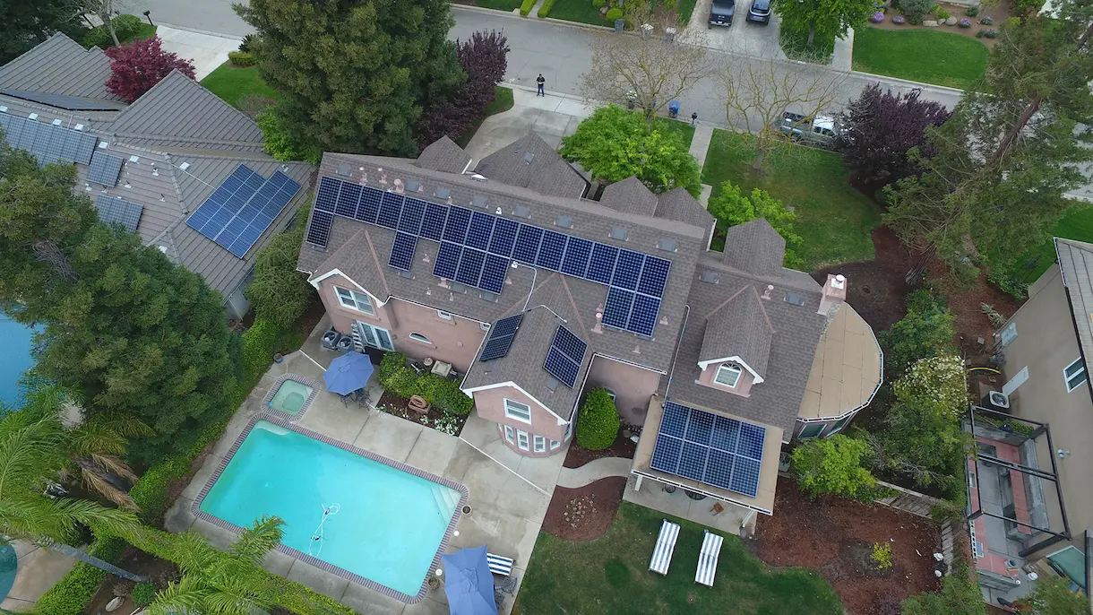 12.24 kW residential solar system on a two-story Fresno home with a pool
